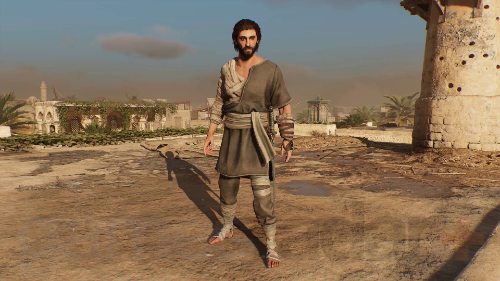Assassin's Creed Mirage Basim iført kostyme med pasientkappe