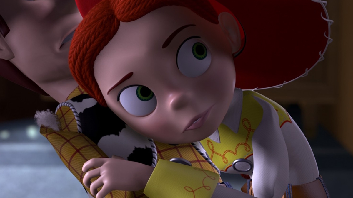 Jessie poslouchá Woodyho hlasivky ve filmu Toy Story 2
