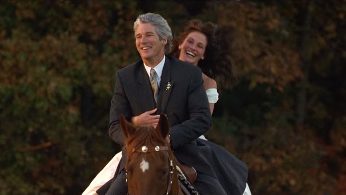 Julia Roberts ja Richard Gere ratsastavat hevosen selässä elokuvassa Runaway Bride (Runaway Bride).