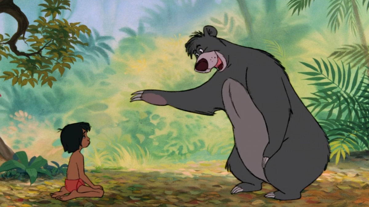 Balu tanzt mit Mowgli in Das Dschungelbuch