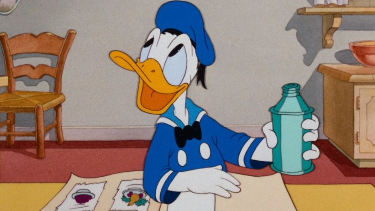 Donald Duck versucht, in seiner Küche zu kochen