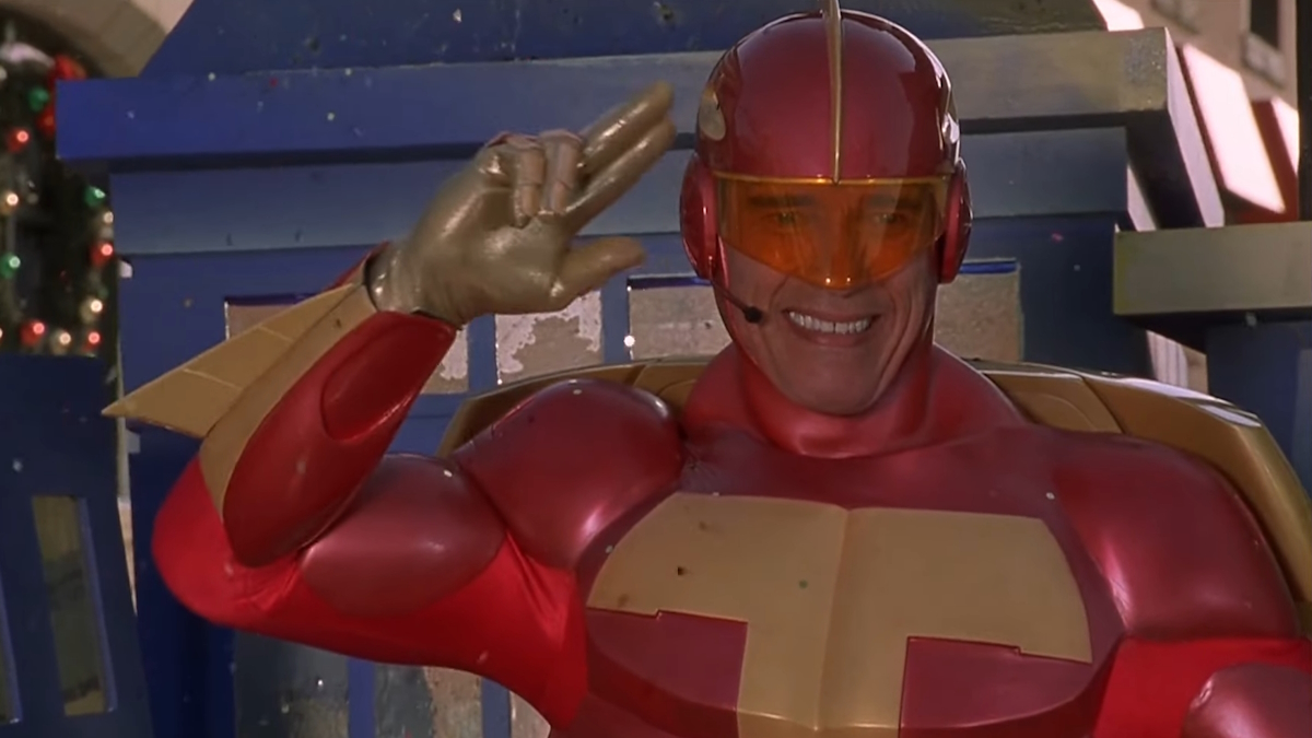 Arnold Schwarzenegger com o fato de Turbo-Man em Jingle All the Way
