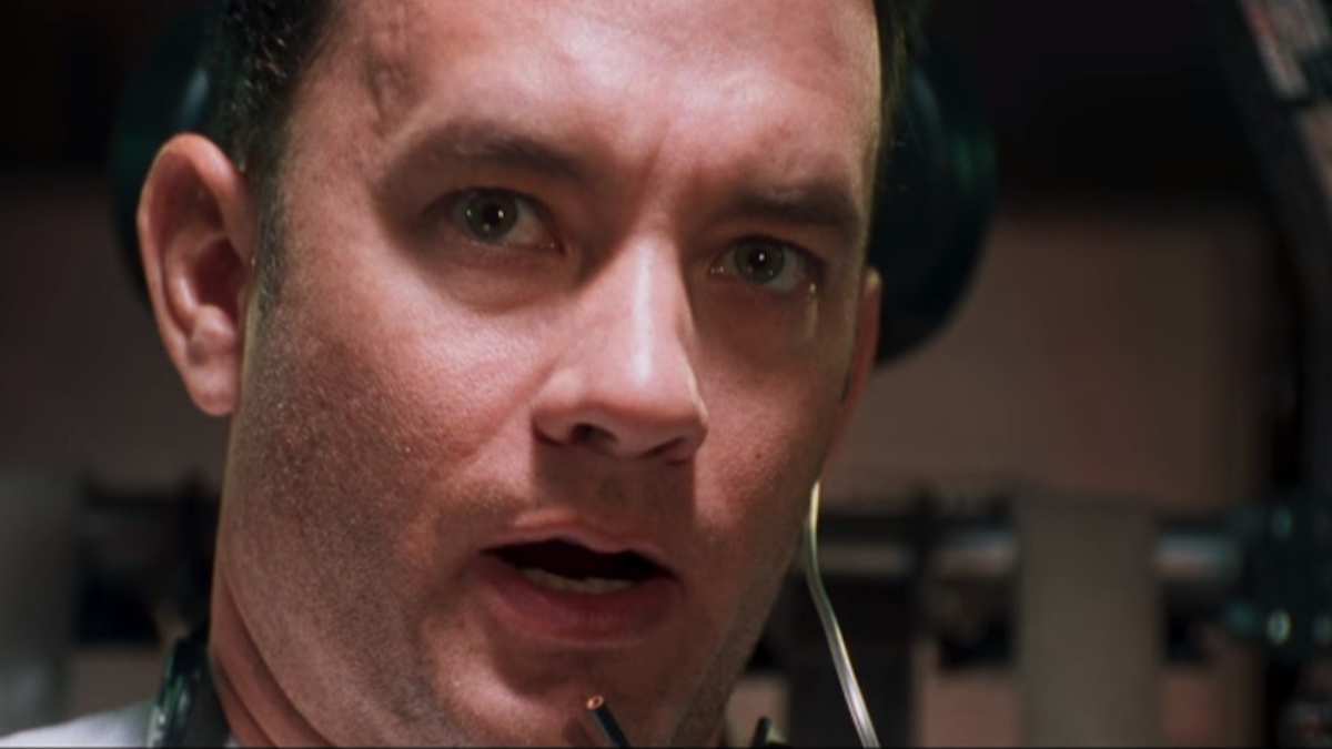 Tom Hanks informuje NASA o problému ve filmu Apollo 13.
