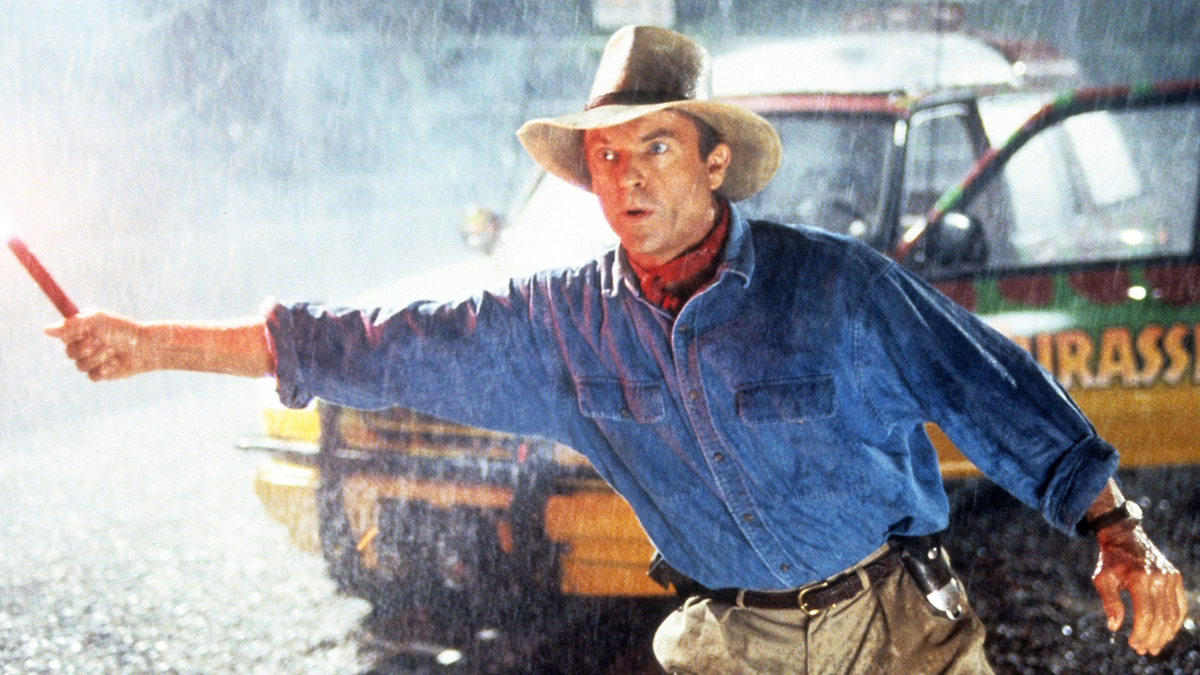 Alan Grant fyrer av et nødbluss i Jurassic Park